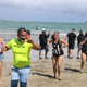 Locals attend a beach protest party in Dorado, Puerto Rico February 2022.